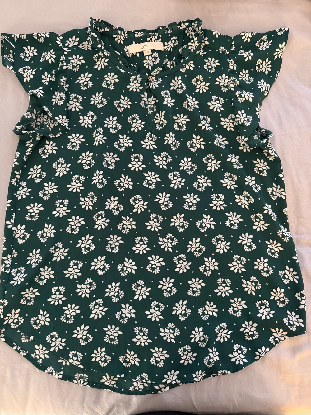 LOFT dark green blouse with a white floral pattern and ruffle sleeves in S